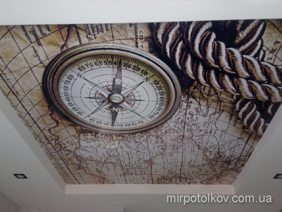 старая карта и компасс на натяжном потолке
